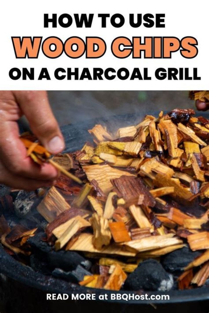 How do I put wood chips on a charcoal grill?