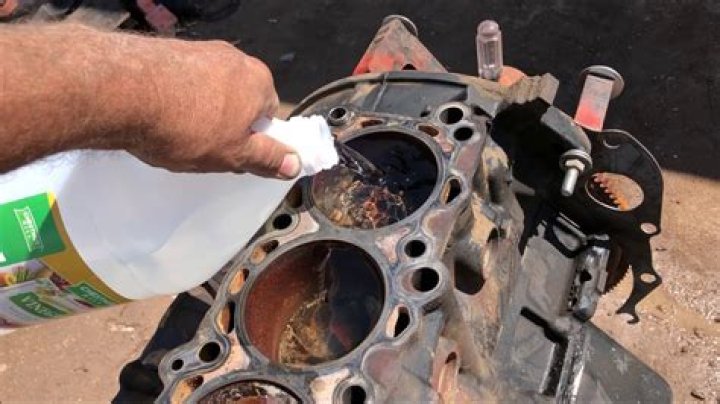 How do you clean a rusted engine block?
