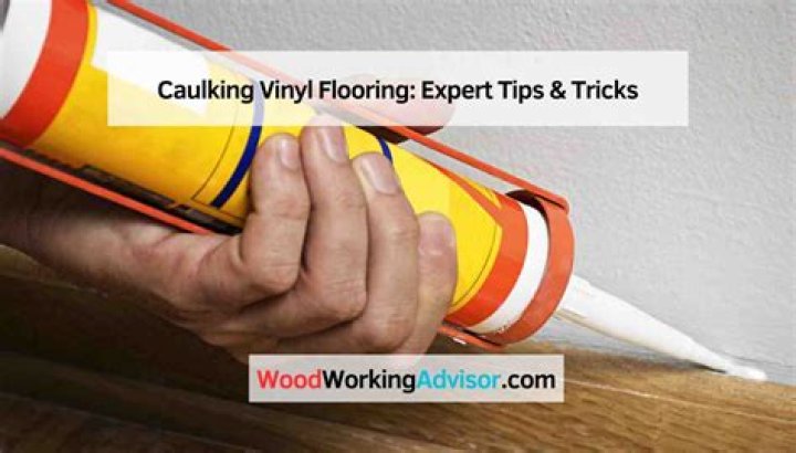 How do you get caulk residue off vinyl flooring?