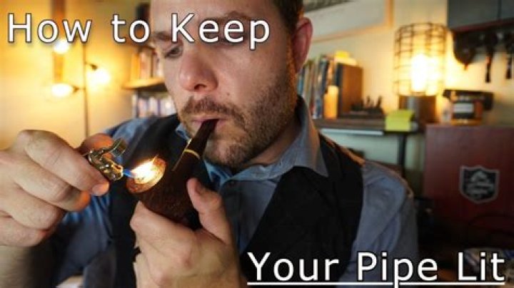 How do you keep a tobacco pipe lit?