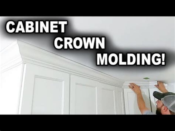 How do you nail crown molding on cabinets?