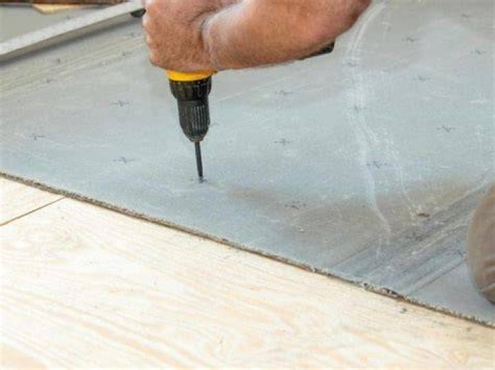 How do you screw down a subfloor?
