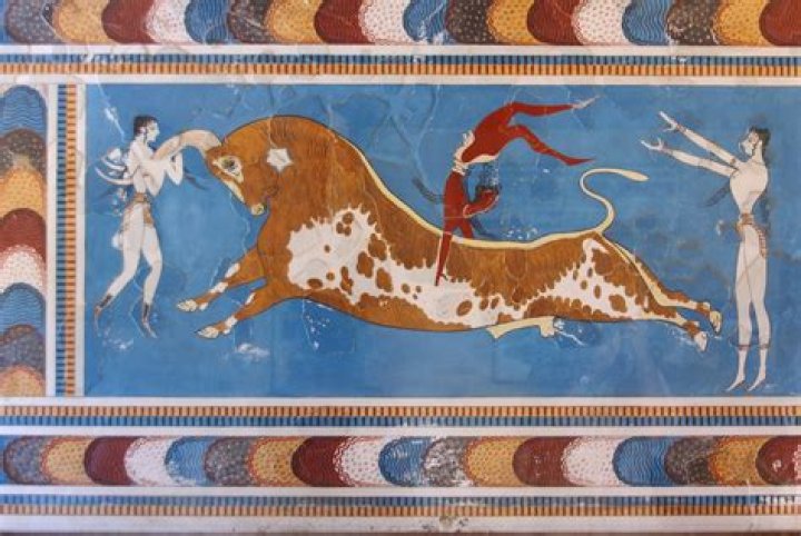 What is the bull associated with in Minoan art?