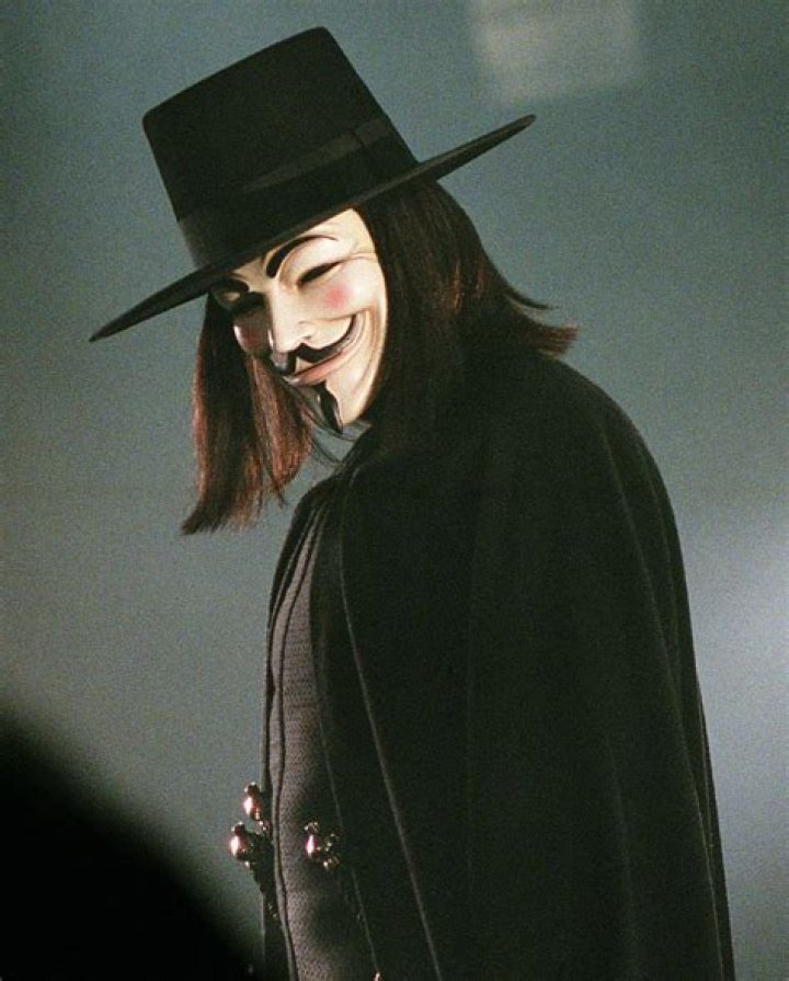 Why does V wear a Guy Fawkes mask?